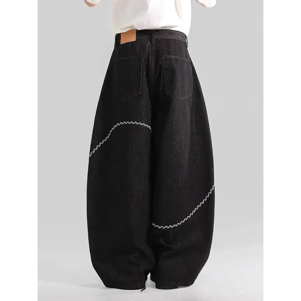 Black straight-leg denim trousers with mid-waist design and micro-elastic fabric