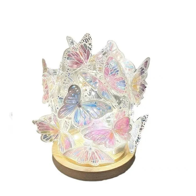 Butterfly night light with glass lampshade on raw wood base for bedroom ambience lighting