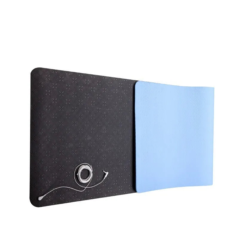 Blue conductive yoga mat with botanical pattern and integrated grounding wire