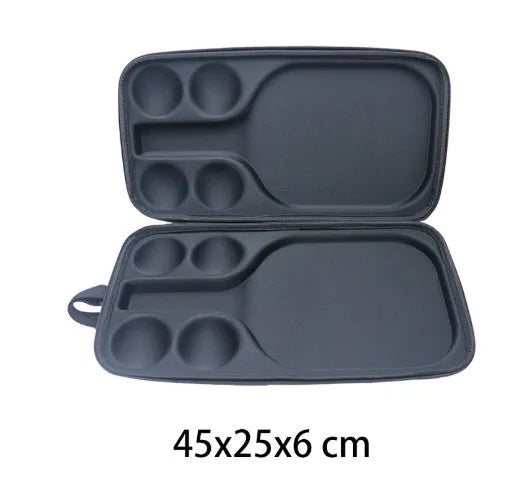Black EVA pickleball storage bag with shoulder straps, holding one paddle and four balls.