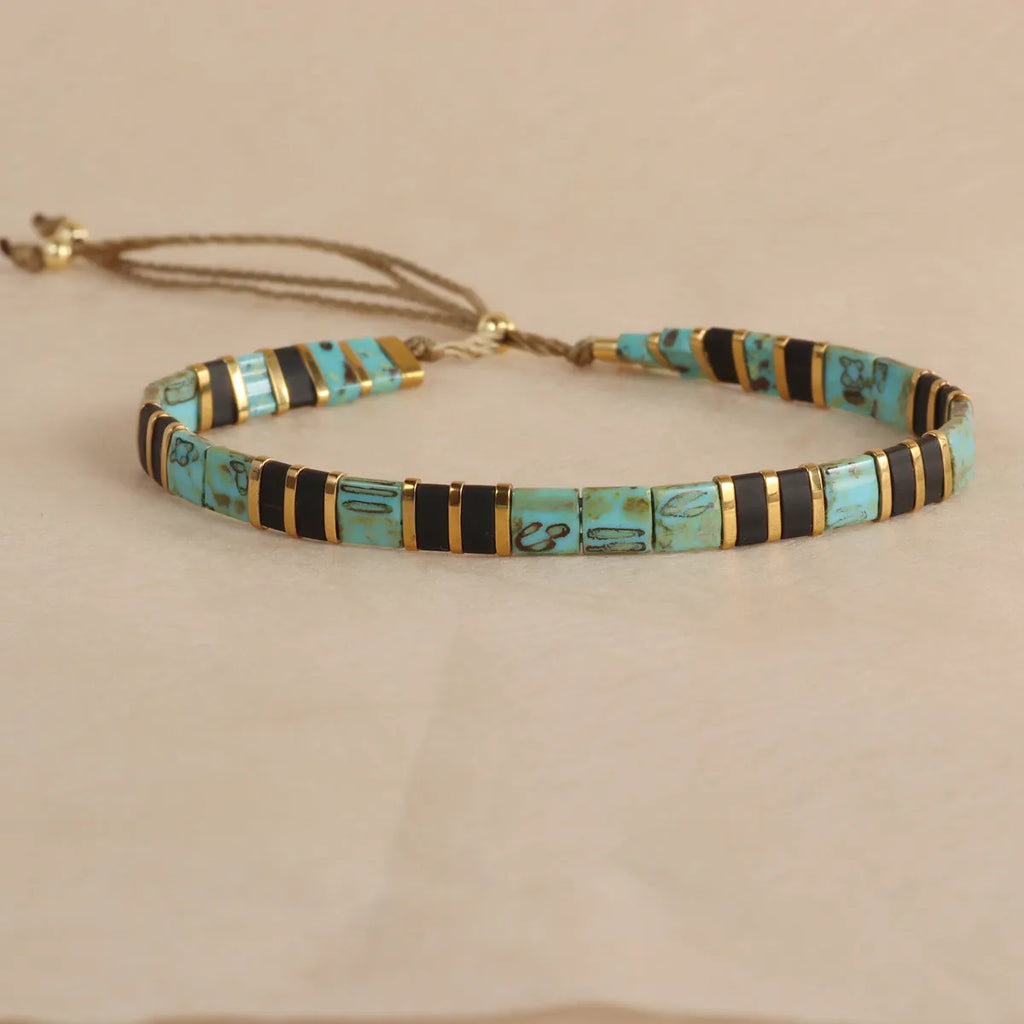 Geometric glass bead bracelet with pull bead closure in five colour options