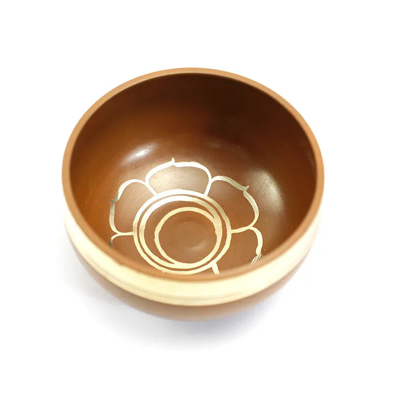 Seven colourful handmade Himalayan-style bowl percussion instruments arranged by size and colour