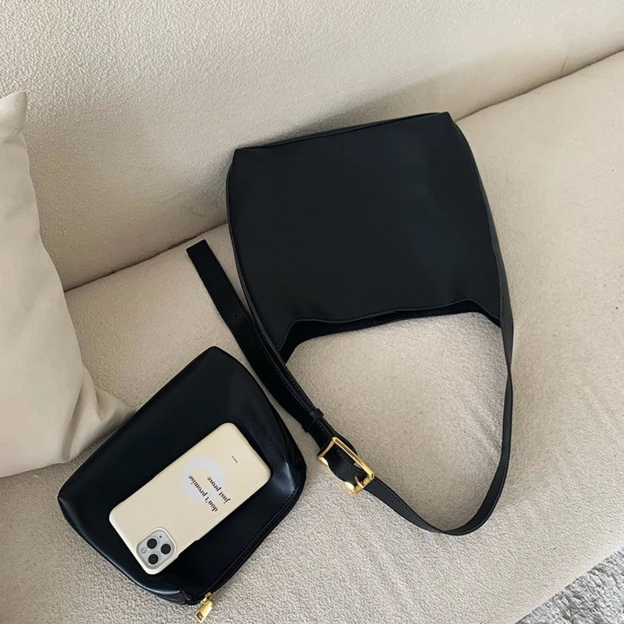 Soft PU leather shoulder bag with swing threads decoration in black or brown colour
