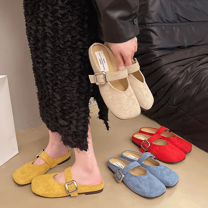 Women's flat closed toe slippers in apricot colour with square head and rubber sole.