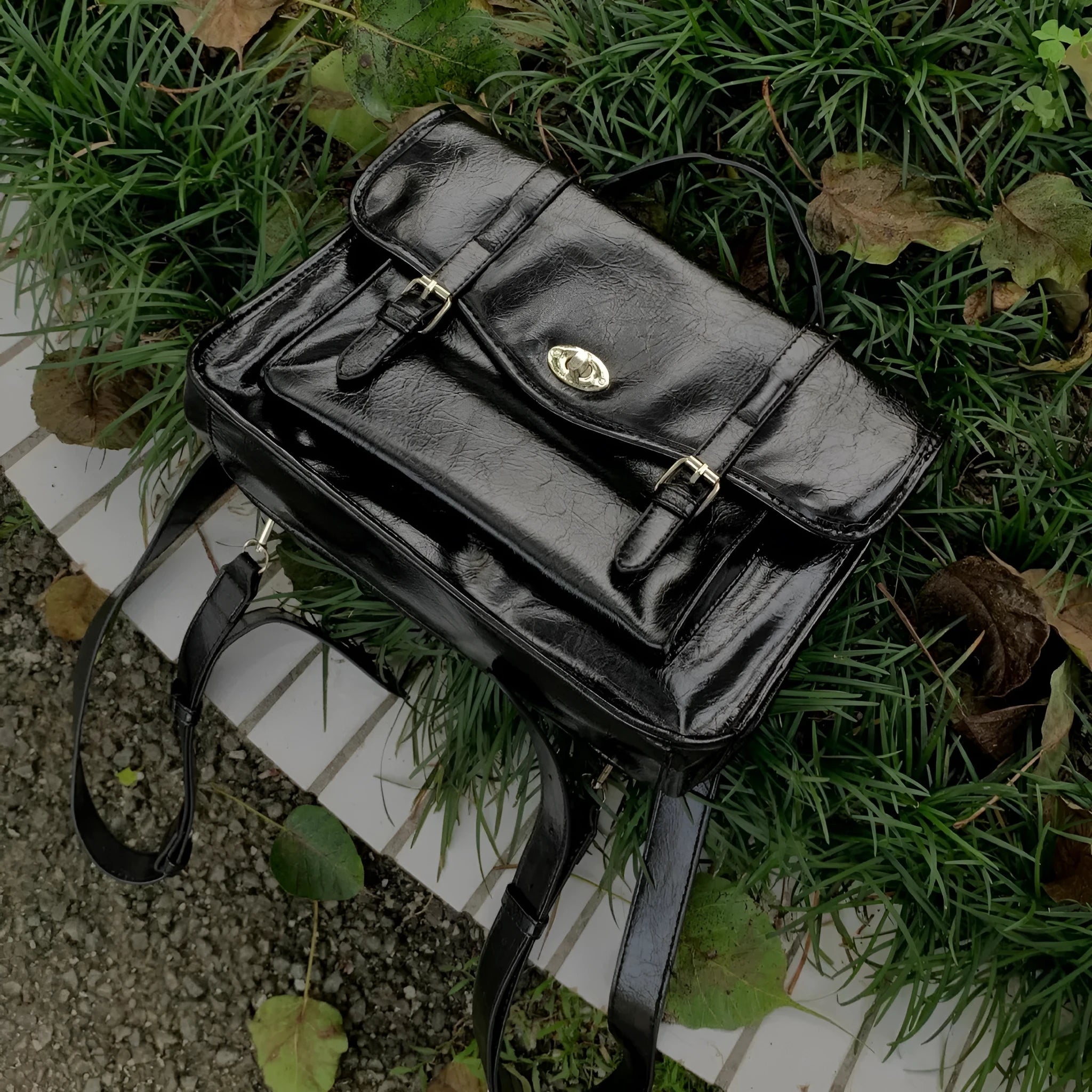 Black oil wax PU leather college style messenger bag for women with crossbody design