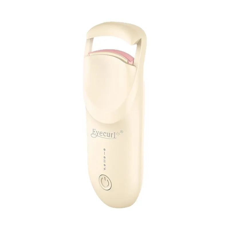 USB electric eyelash curler in cream white, pink, or apricot with charging cable.