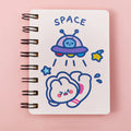 Astronaut pocket flipper notebook showing 10.5x8cm size with space-themed cover designs