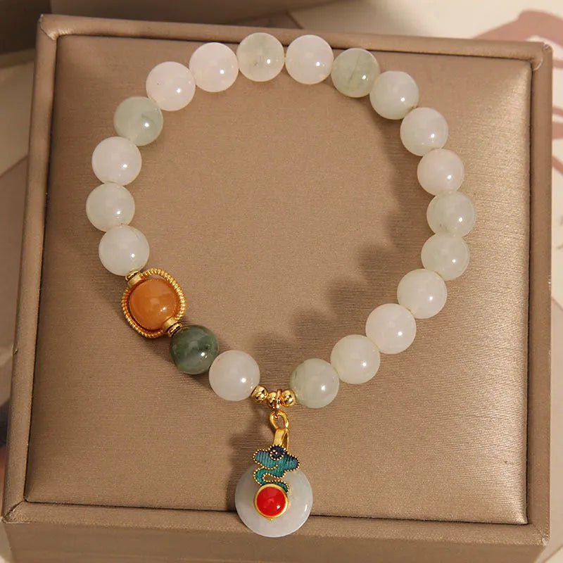 Ice jade women's bracelet with xiangyun peace jade buckle and pearl detailing