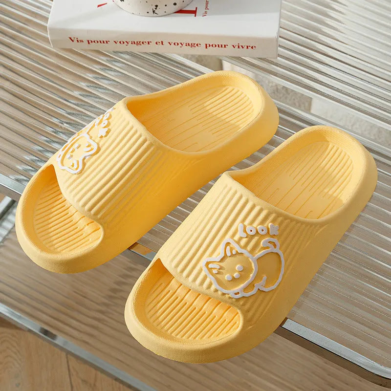 Green EVA foam cat slippers with thick platform sole and anti-slip pattern.