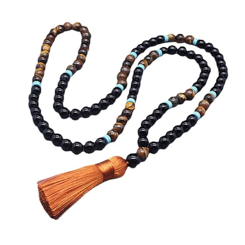 Agate and tiger's eye stone jewellery set with black bracelet and tiger-shaped pendant necklace