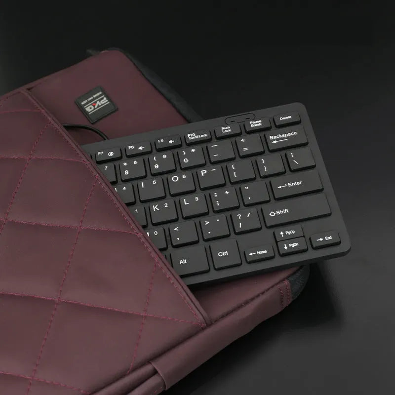USB wired mini keyboard in black, white, pink or blue colours with 1.3 metre cable