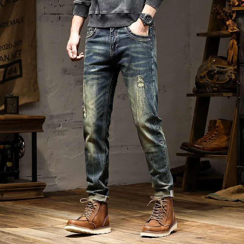 Man wearing retro blue stretch denim skinny jeans with a zip fly.