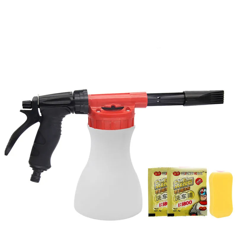 Green foam pot high pressure water gun for garden spraying on a wooden table.