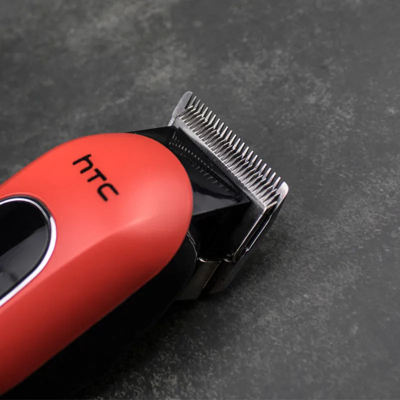 Professional digital electric hair clipper in black, red or white with brushless motor and multiple limiting combs