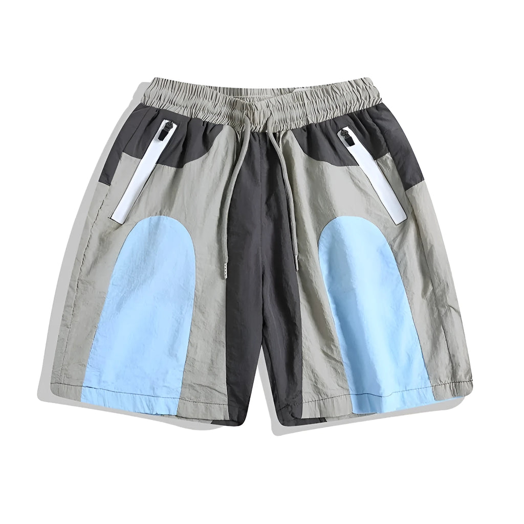 Blue patchwork men's beach shorts with elastic waist and above-knee length for outdoor sports