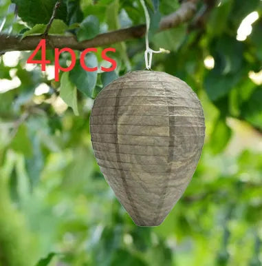 Gold beehive shaped paper lantern with honeycomb texture, shown hanging.