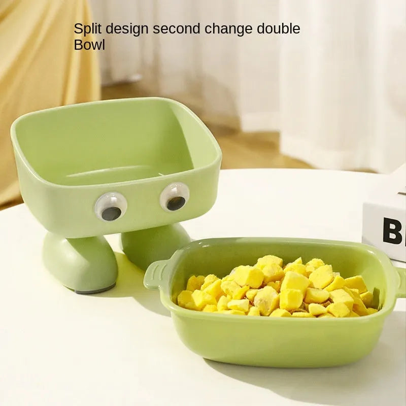 Green elevated cat bowl with robot design, tilted dish, and anti-slip base.