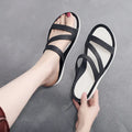 Women's solid colour casual beach sandals made from lightweight PP material, shown in red.