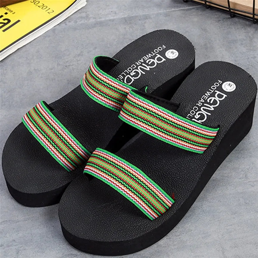 Brown women's bohemian slippers with a raised heel and elastic strap.