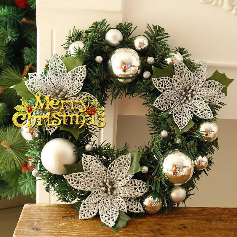 Multicolour plastic Christmas wreath with a 30cm diameter, hung on a door.