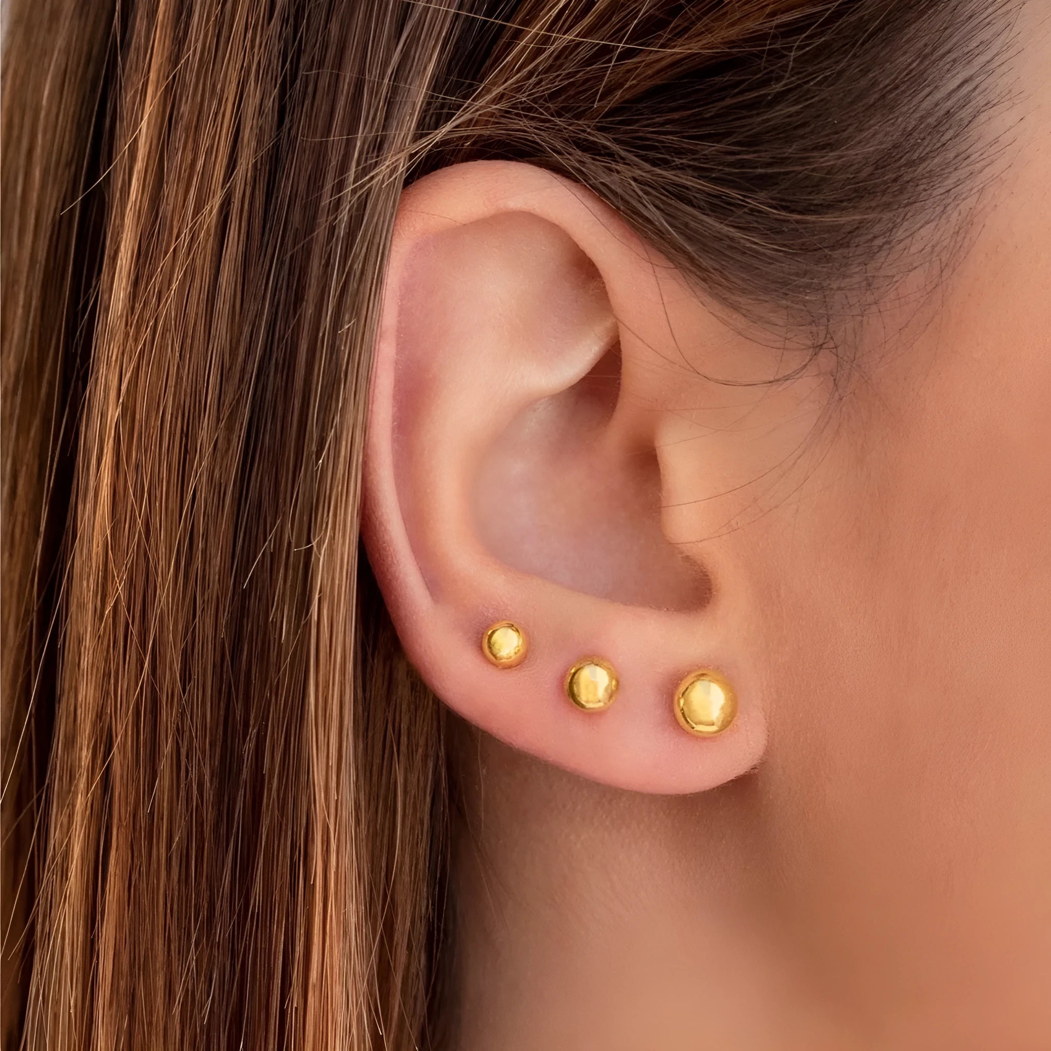 Stainless steel 18K gold-plated ball stud earrings in geometric round design