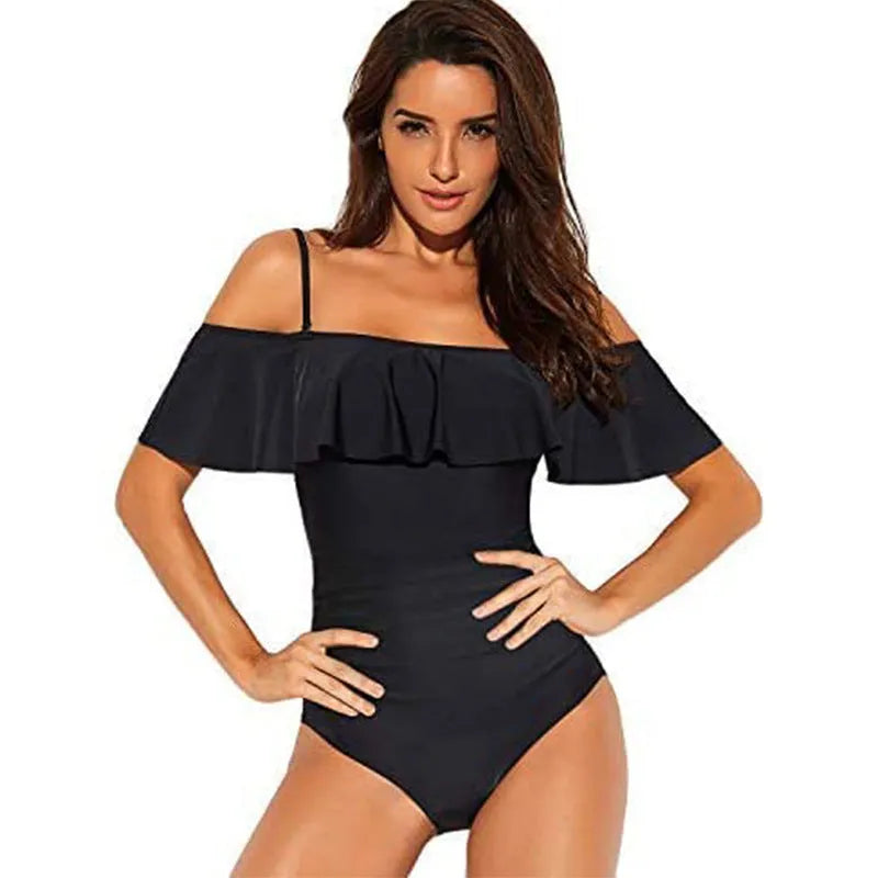 Black one-piece swimsuit with ruffled tube top straps and a cut-out design.