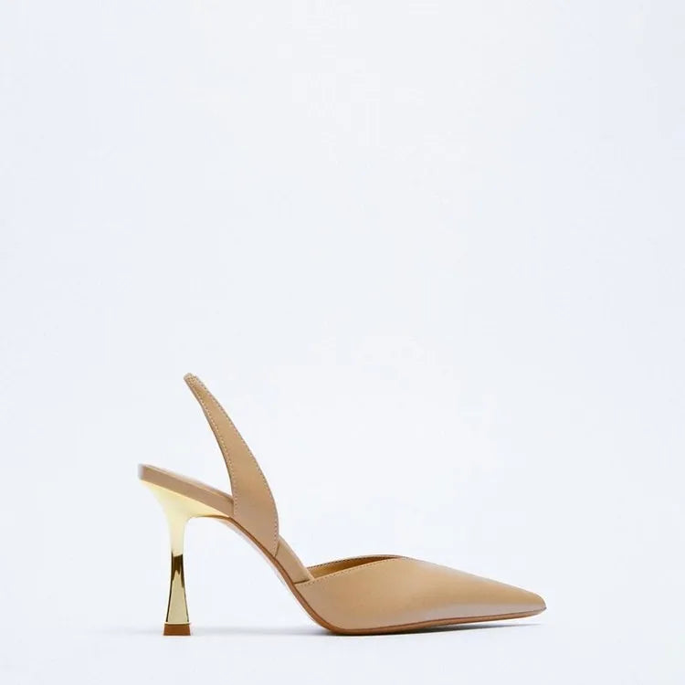 Women's patent leather pointed high heels in apricot and black colours, showing shallow mouth design.