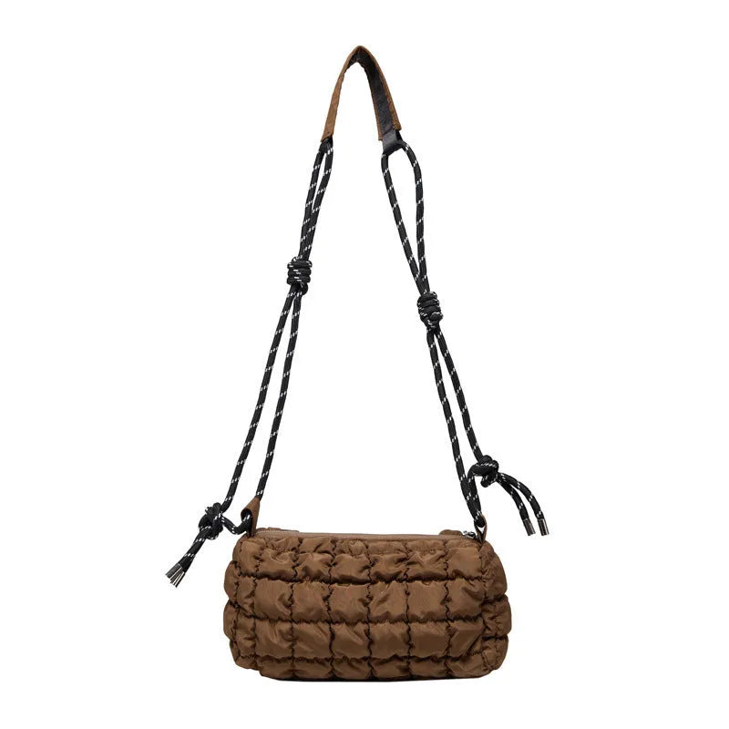 Women's soft nylon messenger bag in pillow shape with rhombus pattern and crossbody strap.