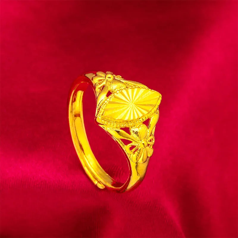 Gold colour brass ring with geometric open diamond flower design and textured details