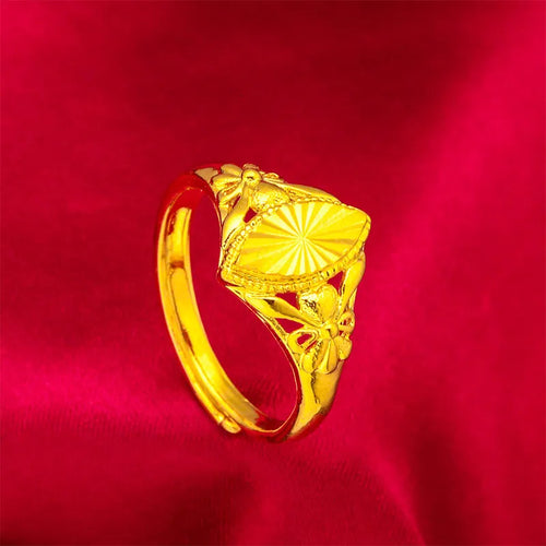 Gold colour brass ring with geometric open diamond flower design and textured details