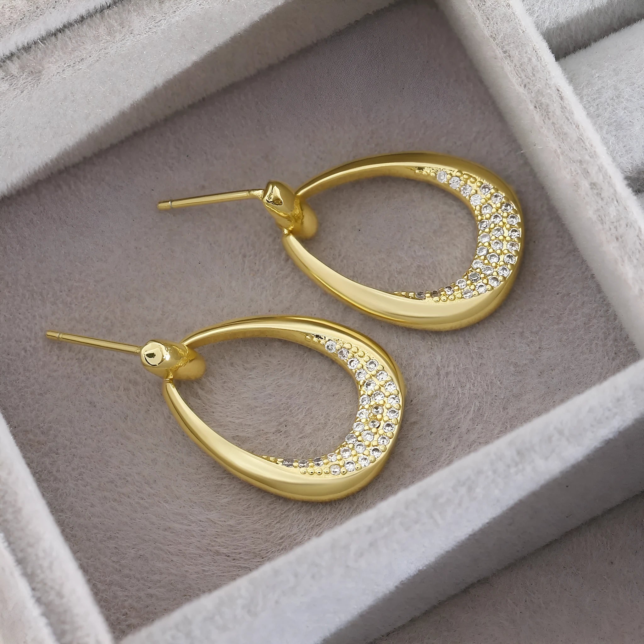 Yellow gold geometric drop earrings with ring design measuring 2.6 by 1.7 centimetres