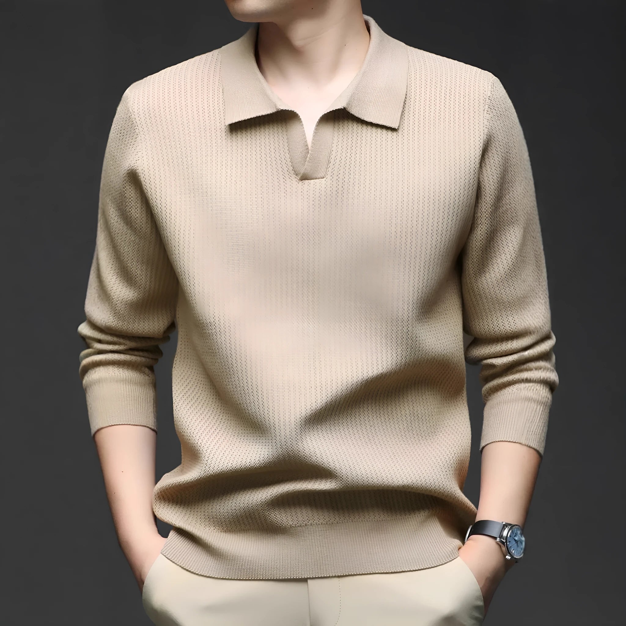 Man wearing a loose green pullover sweater, a casual autumn bottoming layer.