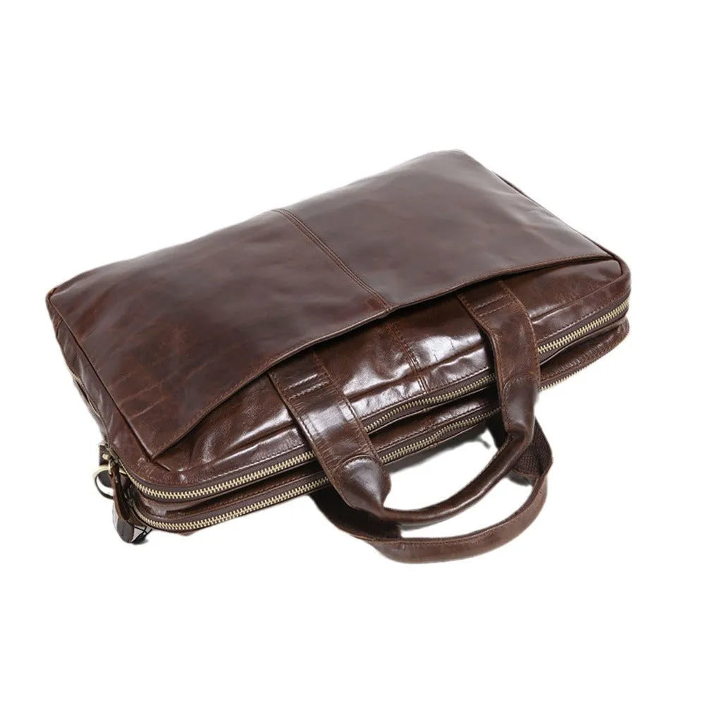 Brown 18-inch first layer cowhide business briefcase with laptop compartment and polyester cotton lining