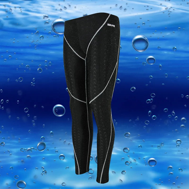 Men's black nylon cropped swimming trunks with mesh lining and contrasting coloured lines