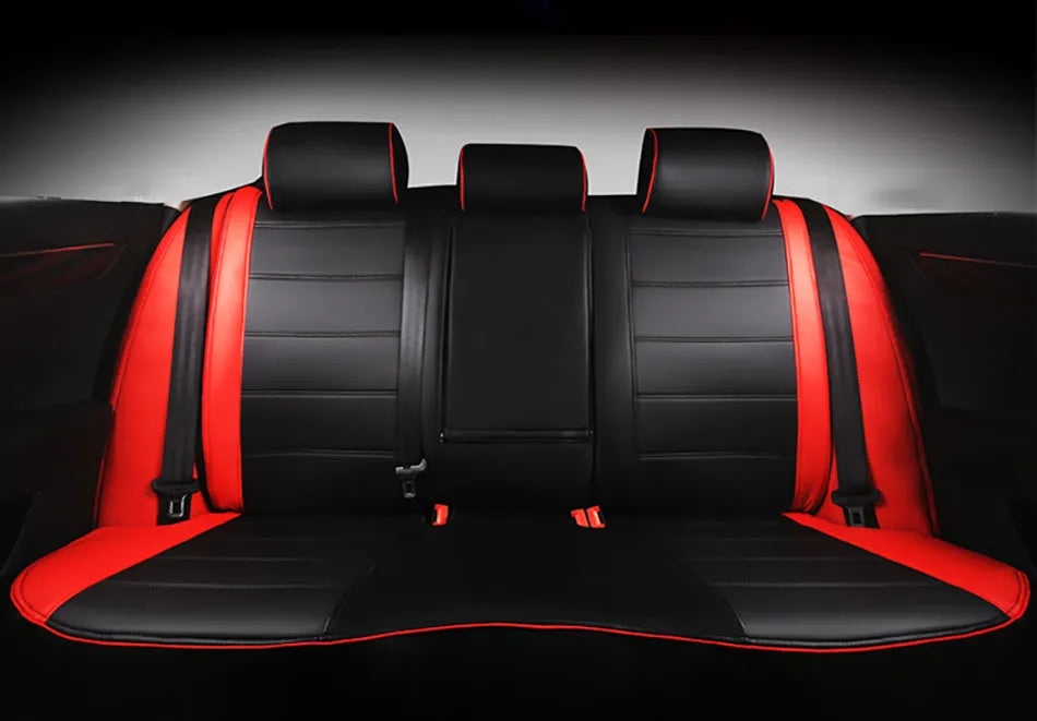 Cow leather car seat cover in beige and black with red line styles, showing binding detail