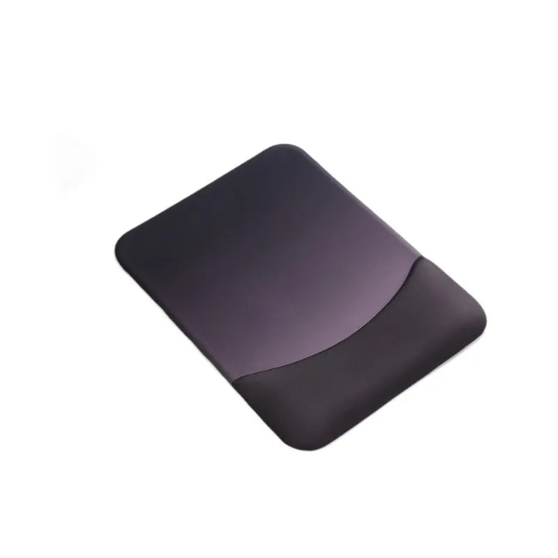 Square black silica gel mouse pad with raised keyboard support area and integrated wrist rest on a wooden desk.