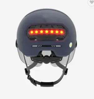 Cycling helmet with red LED brake light on the back, shown in M and L sizes.