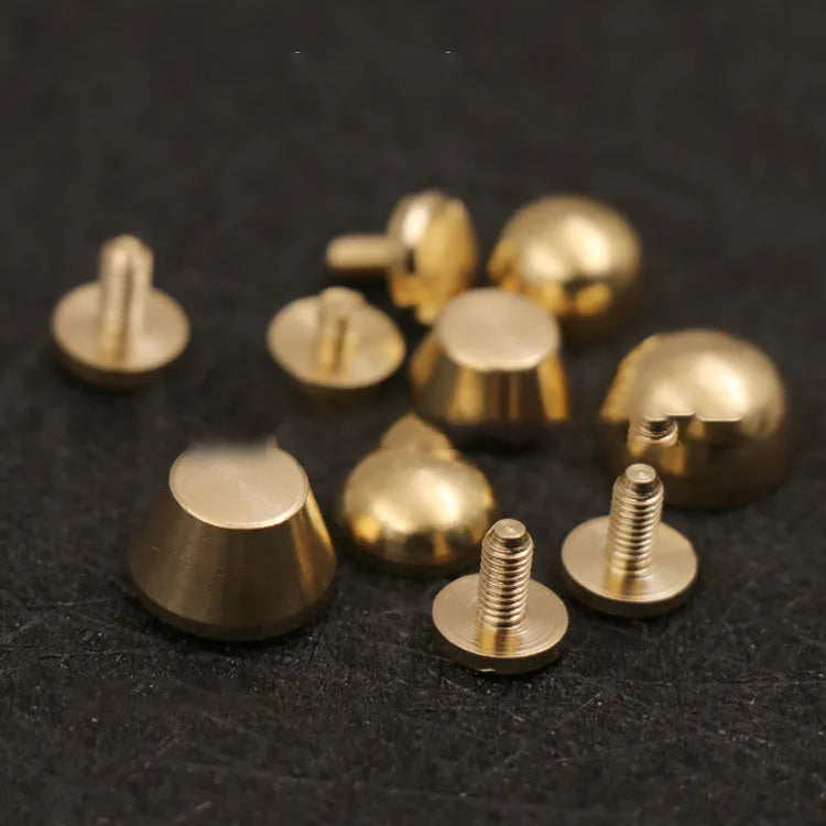 Brass decorative buckle foot nails in round and bucket head shapes, sizes 10x6mm and 12x7mm.