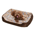 Beige plush sofa-style dog bed with raised sides for a small dog