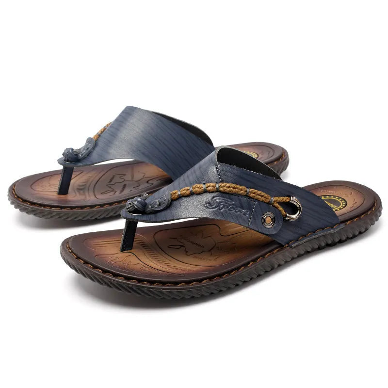 Men's dark blue herringbone patterned outdoor slippers with leather lining and rubber sole, shown in a large size.