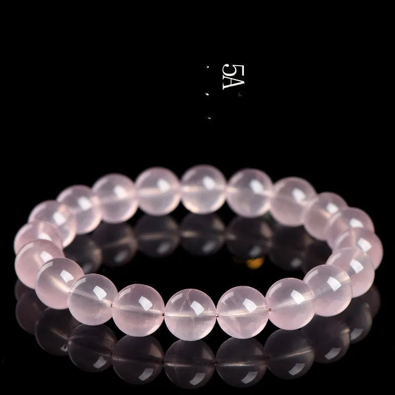 Natural starlight crystal round bead bracelet with pink star colour options and measured bead sizing