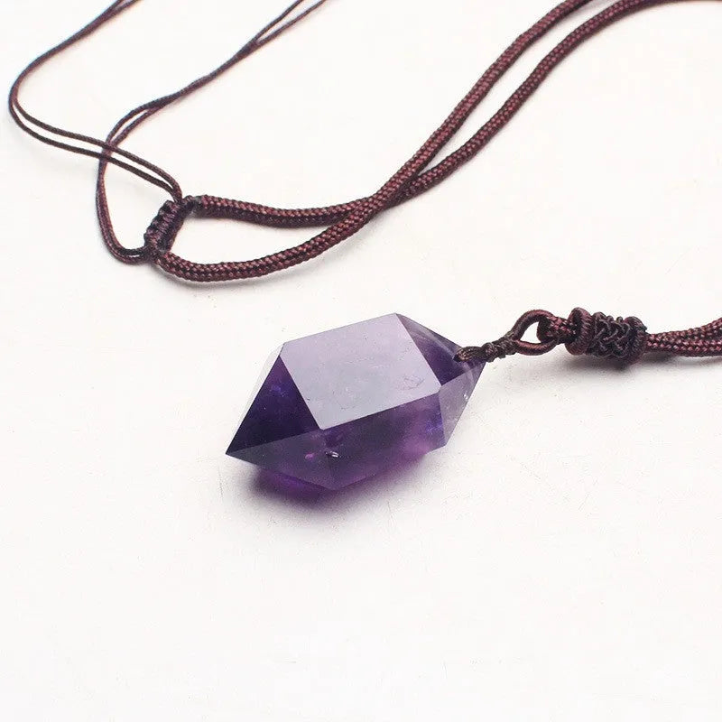 Natural amethyst hexagonal pendant with adjustable chain on purple background