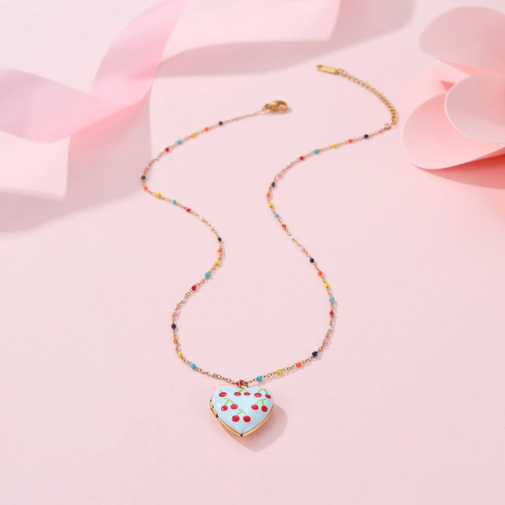 Gold-plated stainless steel necklace with fruit-shaped pendant on adjustable chain
