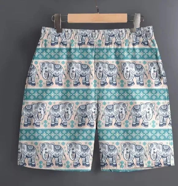 Men's casual polyester shorts in a camouflage pattern, shown in a relaxed outdoor setting.
