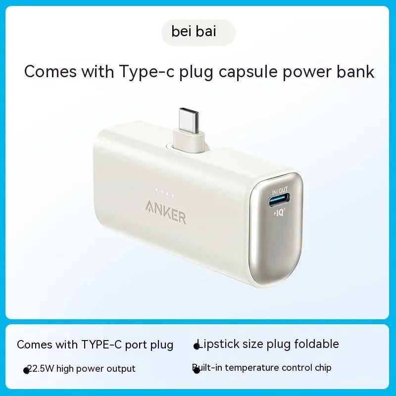 Small capsule-shaped power bank in five colours with a foldable USB-C cable attached