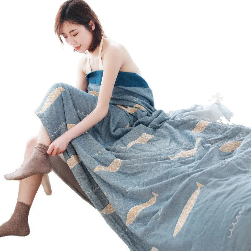Pure cotton five-layer gauze bed blanket in roulette wheel blue pattern, shown in modern simple style.