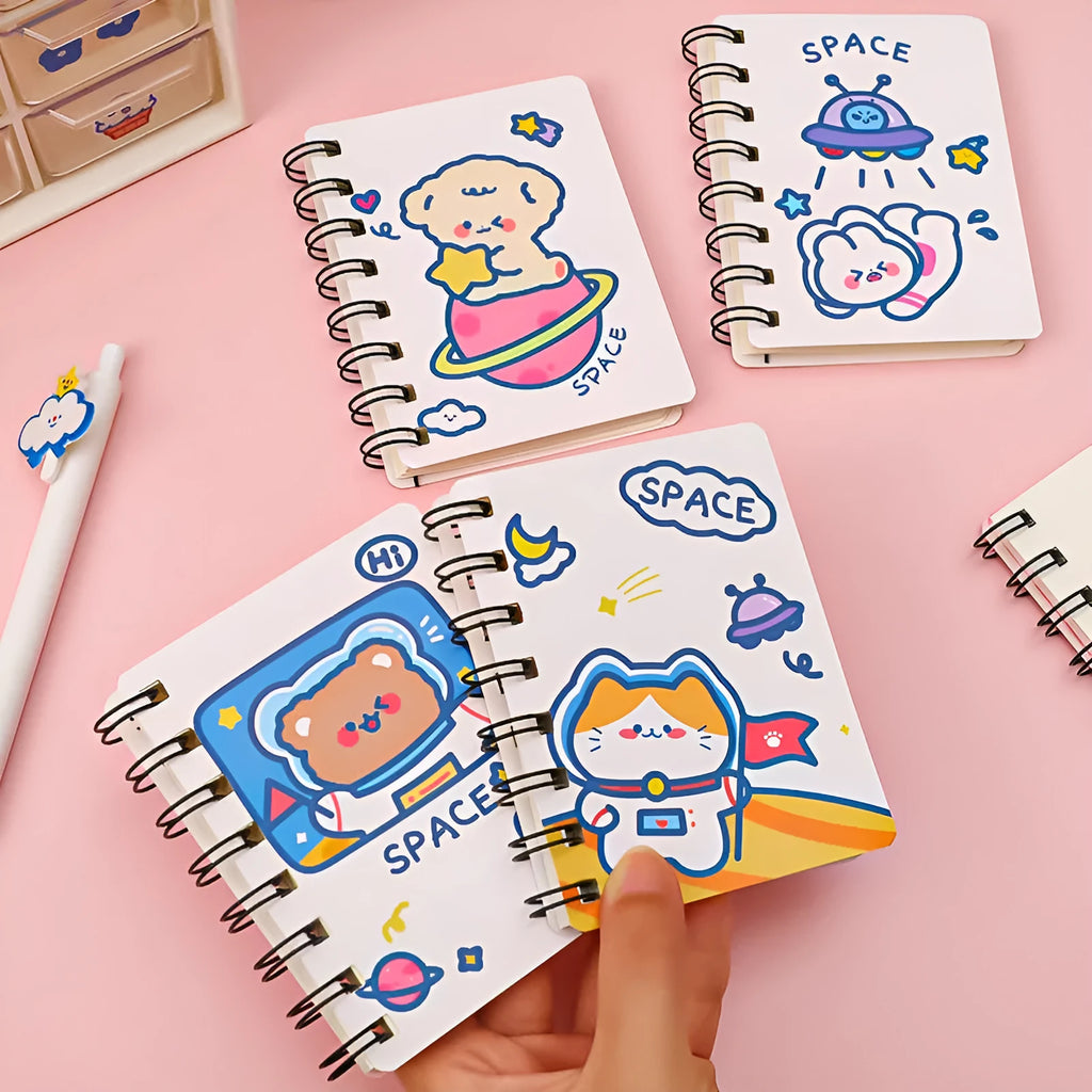 Astronaut pocket flipper notebook showing 10.5x8cm size with space-themed cover designs
