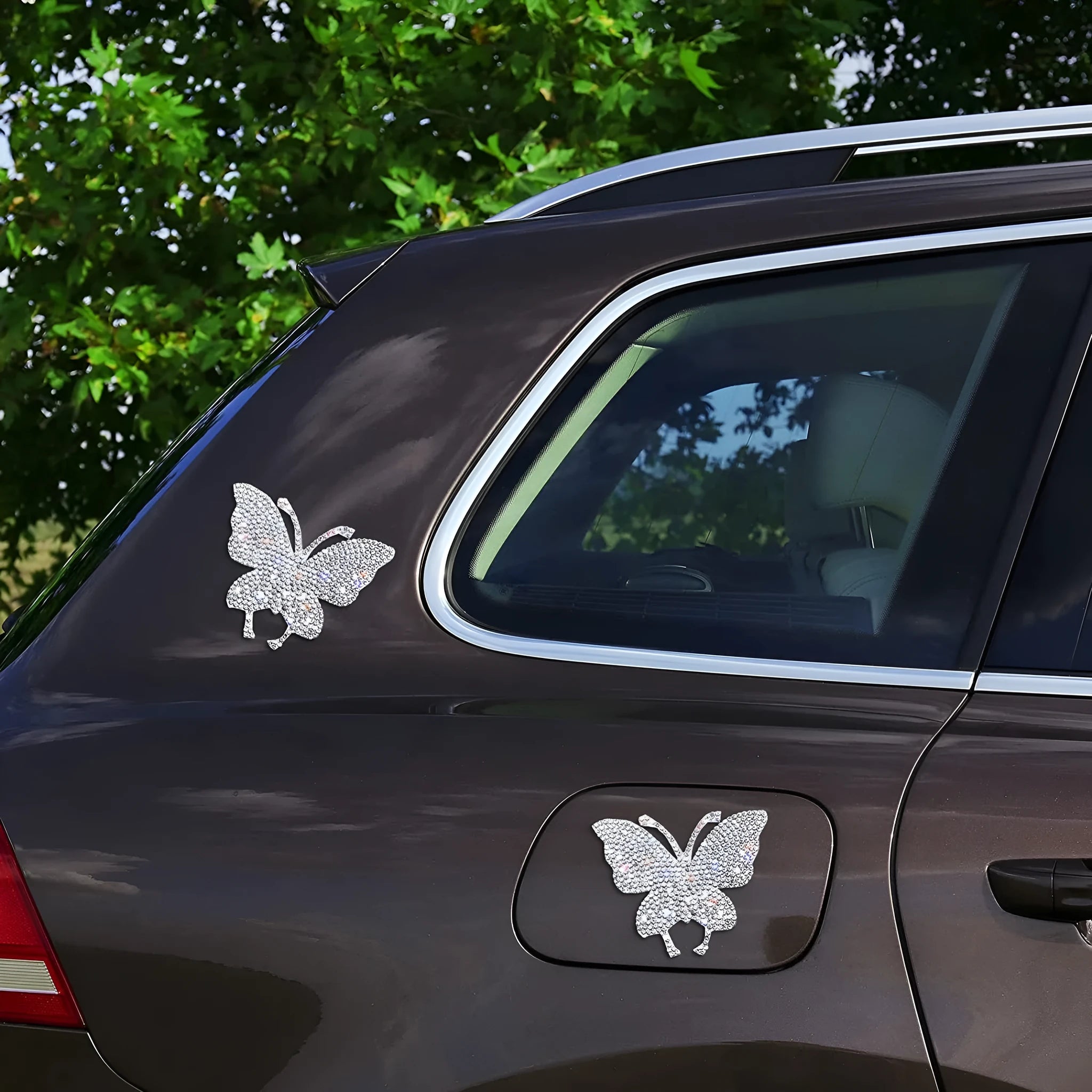 Diamond-encrusted glass car sticker with butterfly or bear paw design measuring 7 by 6 centimetres