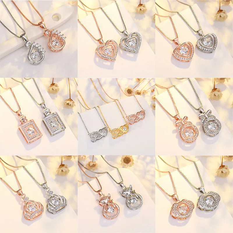 Silver heart-shaped pendant necklace with crown and bow charms for women