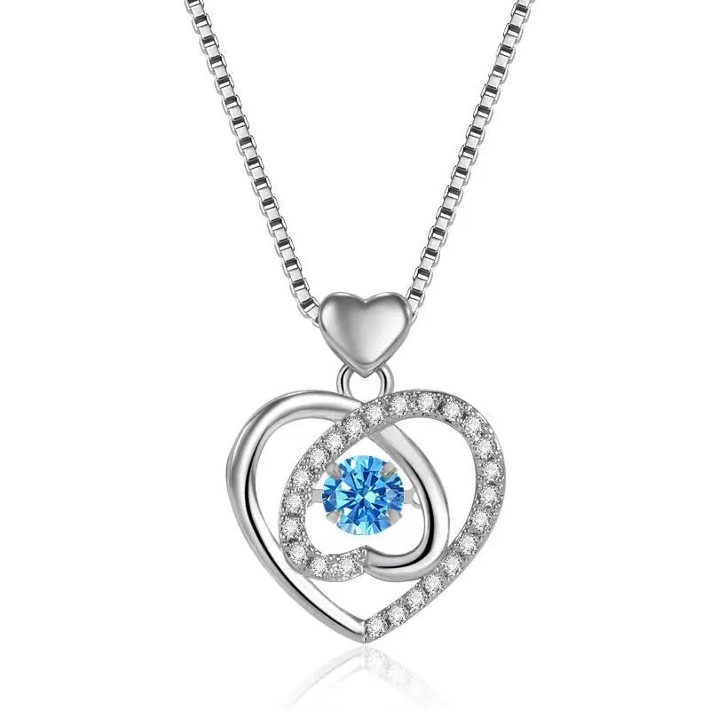 Blue heart-shaped necklace and bracelet set with mixed gem inlay on geometric pendant